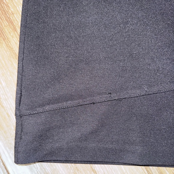 Black mini skirt BB Dakota featuring a unique diagonal sheer mesh panel detail.4 - Picture 7 of 8